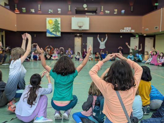 Weekly "KapKa Connects" where the whole school gathers for songs and activities