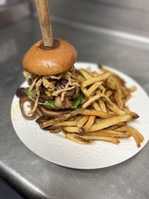 Sally's Classic Burger add Colby Jack cheese, Apple wood smoked bacon, grilled onions and Haystack onions. House made fries.