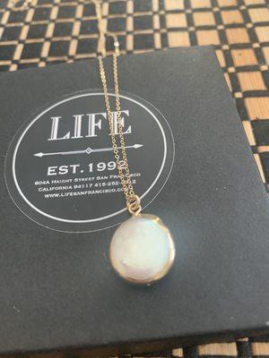 Looks  like a pearl and is very delicate