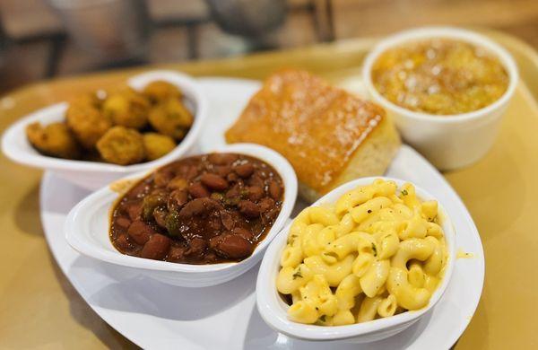 Veggie Combo: Mac N Cheese, Red Beans, fried Okra, and cornbread with Peach Cobbler