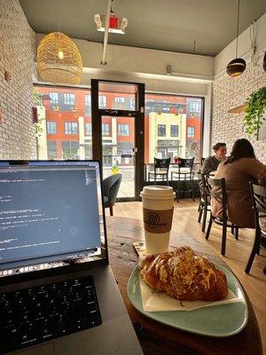 Coffee with ham and cheese croissant