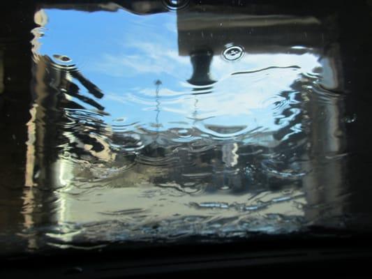 The Water Running Down My Windshield Is Kinda Artsy