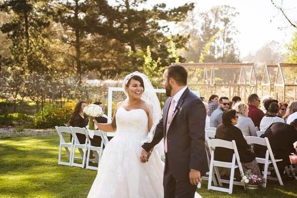 My new groom admiring his new wife in her Allure gown!