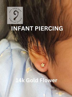 Baby Ear Piercing Experts  This little one shines in 14k gold earrings, crafted for safety and the sweetest look for her first piercing.