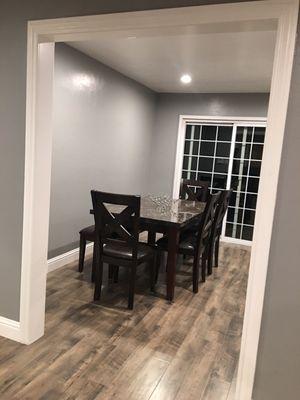 Upgraded chairs & bench with marble top dining table.