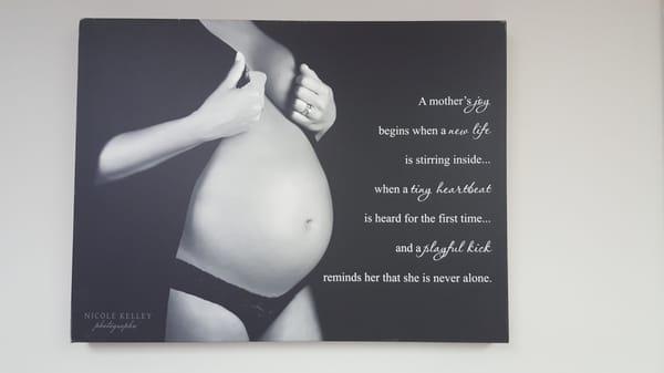 What a pretty pregnant belly and a great saying.