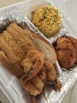 Catfish w/ seafood rice and conch fritters