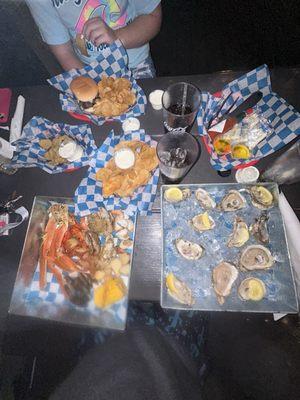 Mushroom Swiss Burger, Home Chips, Fried Pickles, ROTTEN raw oysters, and Seafood Boil