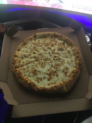 Medium pizza in a large box