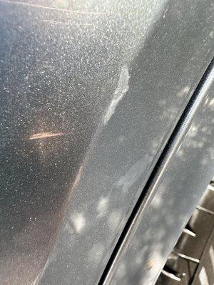 Scratched damage by Machine of this car wash