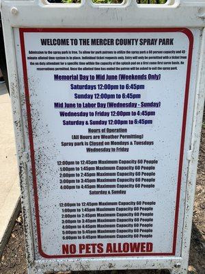 Mercer County Spray Park (splash) sign with hours (July 2023)