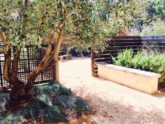 Outdoor area with seating in the back.