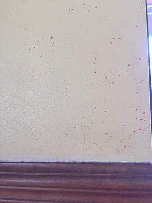 Nasty fried red soda splattered on the walls