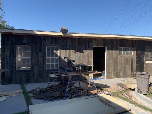 Reclaimed fence board siding