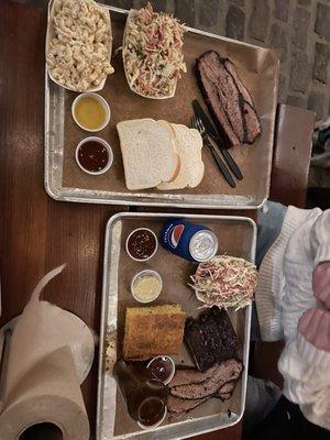 Sliced Brisket, Macaroni Salad, Cole Slaw, complimentary white bread, Cornbread with Honey Butter