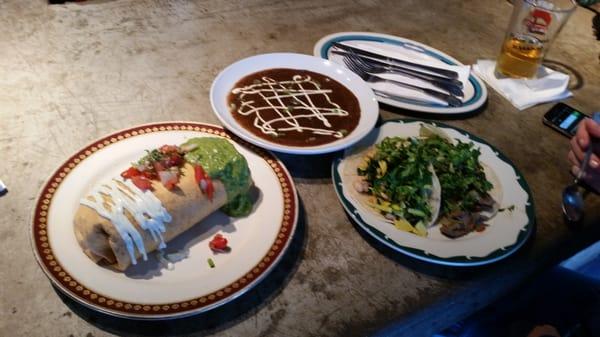 Yum! Chicken burrito, spicy black bean soup, and tacos!! This is ordered from Pop's Garage next door.