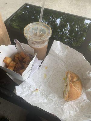 home fries, egg sandwich, iced coffee