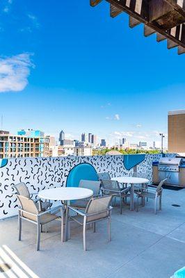 Our amazing Rooftop Pool that showcases stunning views of Midtown and original mural artwork.