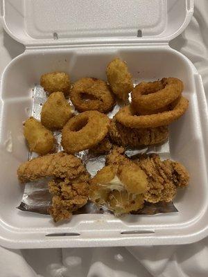 literally 4 onion rings. 3 half sizes of chicken strips. and cheese bites.