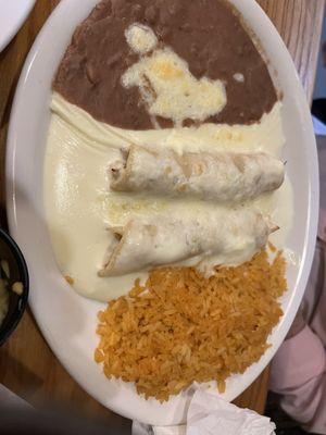 Shredded chicken enchilada plate