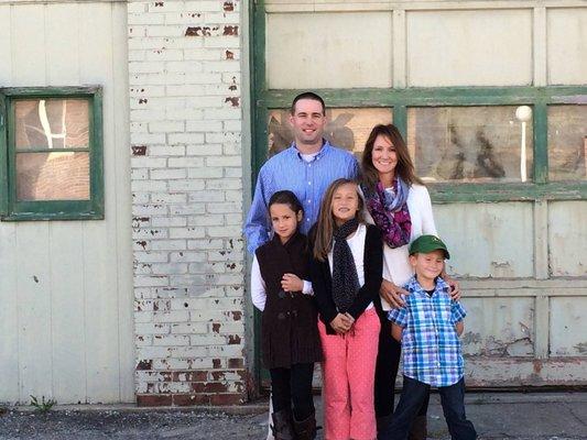 When it ALL began, Willcott Family standing in front of the future 1st location of Willcott Brewing Company, Holton KS.