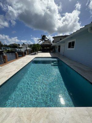 Pool resurfacing and pool deck installation in Lighthouse Point