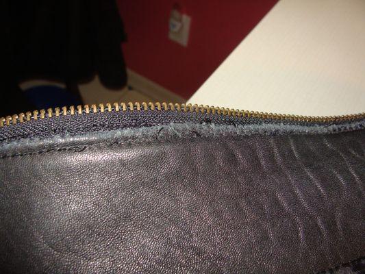 inside of coat chewed up when new zipper was put in