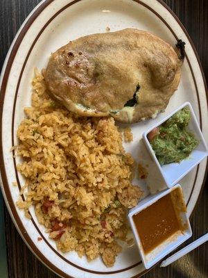 Chili relleno, guacamole, rice, sauce