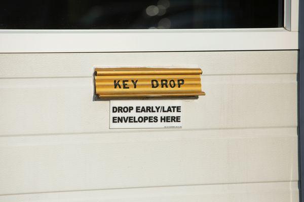 Place key in envelope here