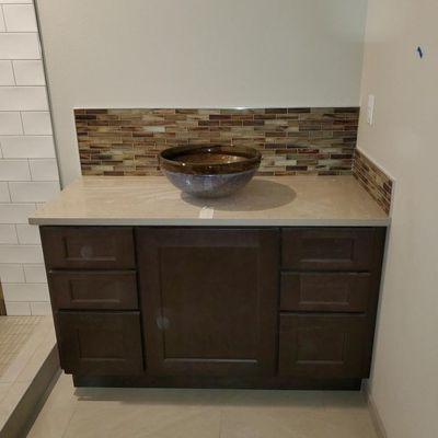 Sahara Pental Quartz vanity top with a vessel sink