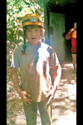 He was all muddy after the cave adventure. Boys will be boys!