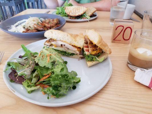 Front: harvest chicken sandwich  Back: steak gochujang sandwich