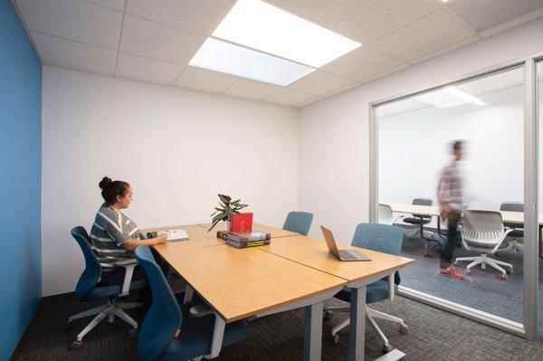 This is one of 2 medium private offices for 4. An internal skylight shines in as well.