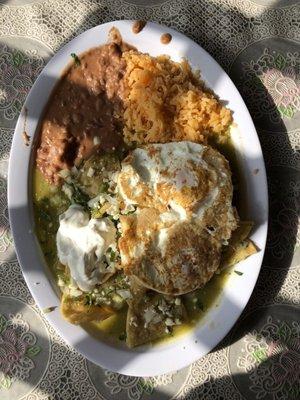 chilaquiles con salsa verde and the refried beans are so good!!