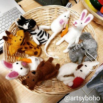 Check out our cute little handmade fingerlings. We like to call it the Animal Planet in a basket.