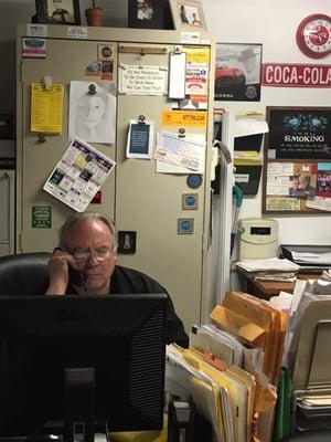 Owner, Bobby Moore, seen answering one of the many phone calls he receives a day