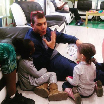 The doctor himself reading a story in the waiting room after my daughter was too scared to sit in the exam chair