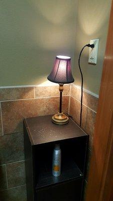 I love this lamp and table... that's in the bathroom. Really relaxing. Haha!