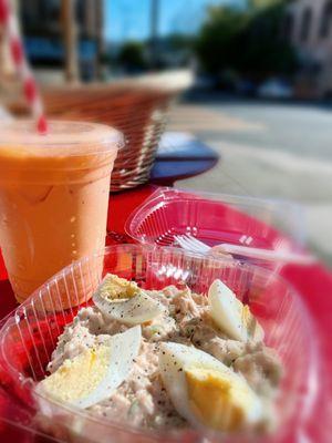 Thai ice tea; tuna salad with hard boiled egg.