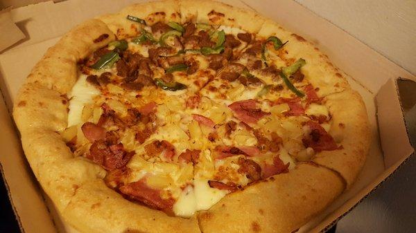 Stuffed crust. Side 1: Italian sausage and green bell peppers. Side 2: ham, bacon, and pineapple.