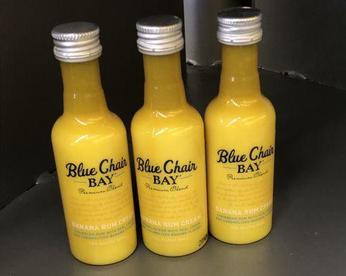 12/21/20. Monday afternoon. In the liquor store. Minis of Kenny Chesney's Banana Blue Chair Bay Rum! $1.47.