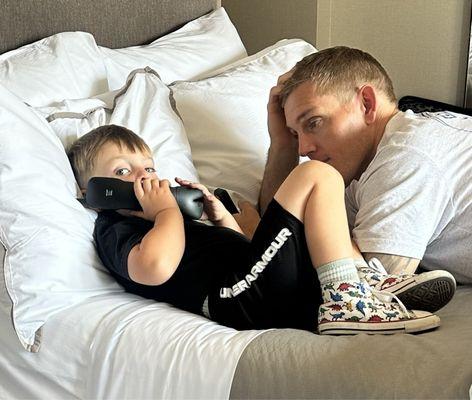 Enjoying his own Westin bed at age 3.