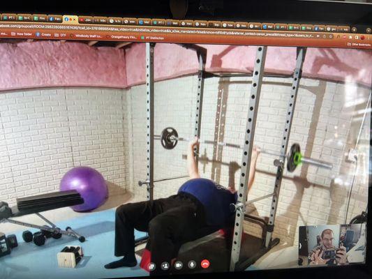 Rick, age 70, crushing a barbell bench press in Michigan via Fire Inside Fitness' Customized Virtual Training Program