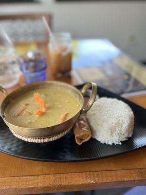 Lunch special yellow chicken karee. Plus non-Thai egg roll.  Very thin curry.