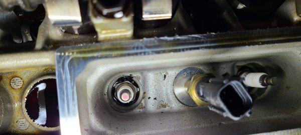 oil leak thru valve cover gasket