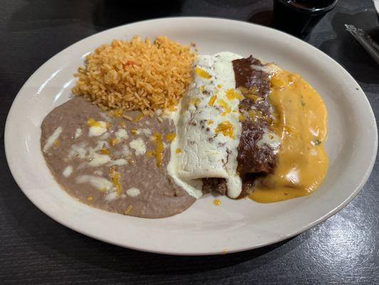 Chicken, beef and cheese enchiladas.