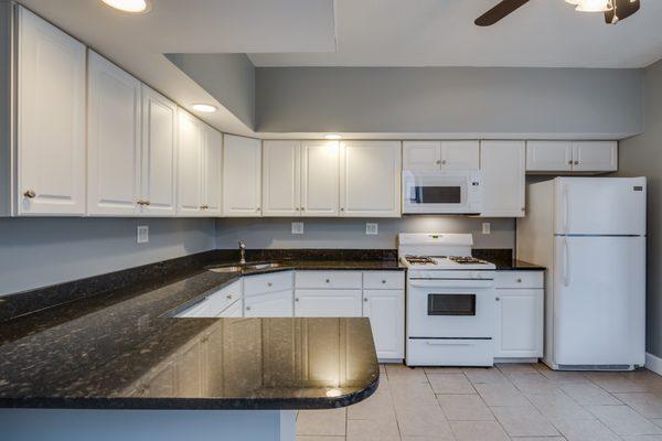 Fresh paint, cabinets and granite counter tops to give this old 1890s home a fresh and updated look