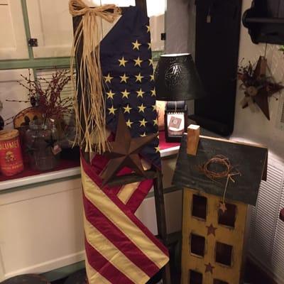 Show your patriotism! This Flag wrapped ladder with metal star is available(limited quantities) at Heart Felt Designs Country Shop