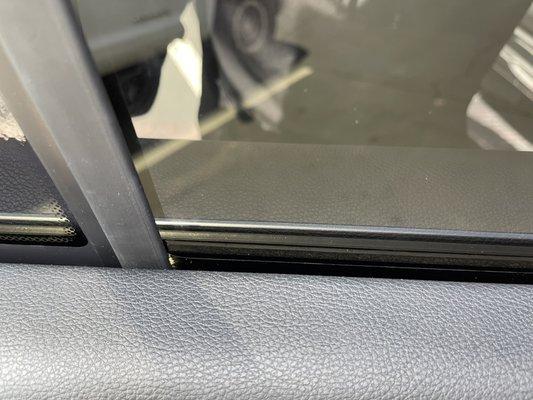 Tint not tucked under window seal