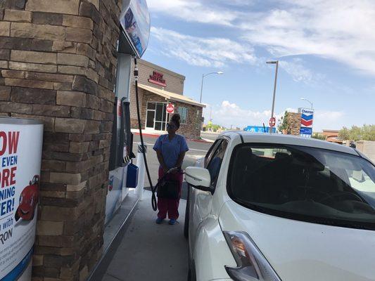 Our first customer pumping gas in brand new Chevron